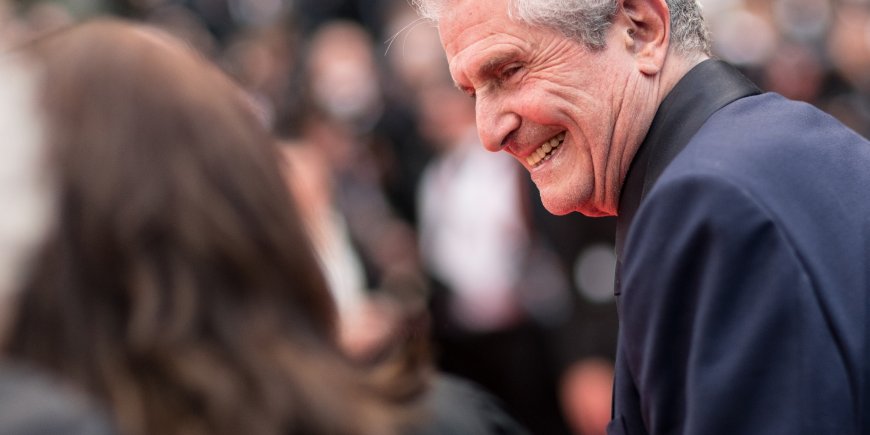 Claude Lelouch lors de la montée des marches du film