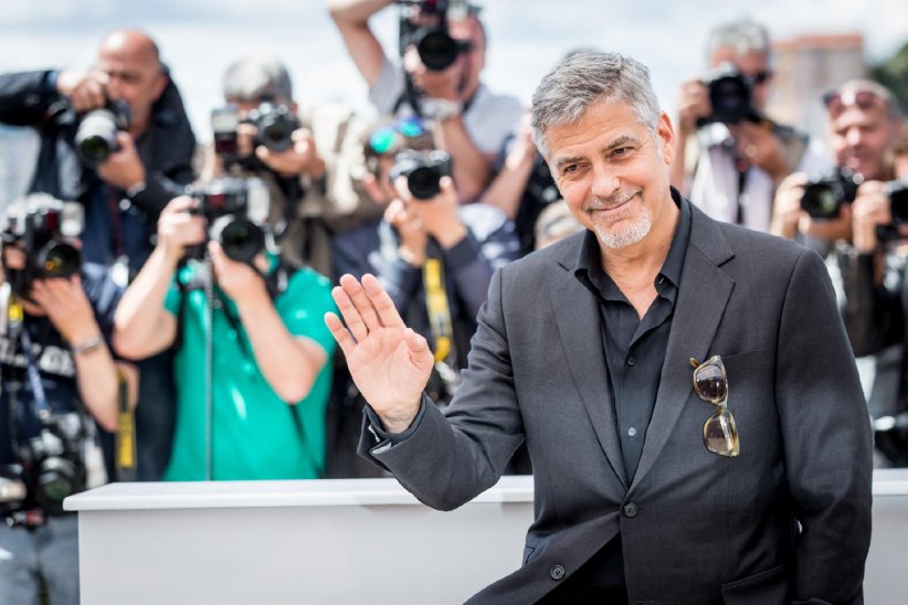 George Clooney et son cochon vietnamien George Clooney et son cochon vietnamien