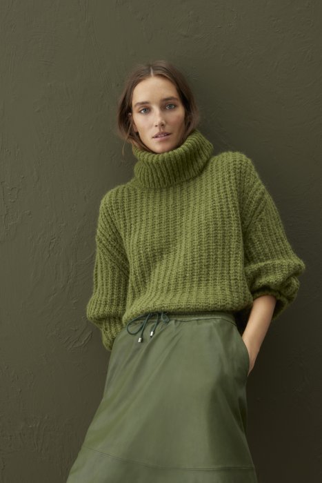 Un gros pull à col roulé Un gros pull à col roulé