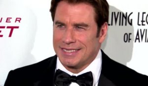 John Travolta écorche le nom d'Idina Menzel en la présentant aux Oscars