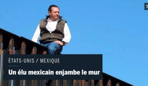 Un député mexicain enjambe le mur entre les États-Unis et le Mexique