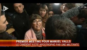 Valls pris à partie par une militante après son meeting