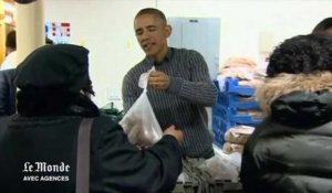 Les Obama distribuent de la nourriture à Washington