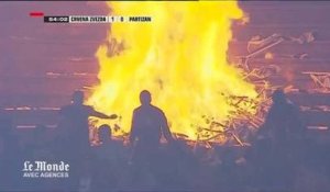 Des supporters serbes mettent le feu au stade