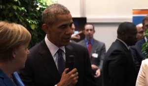 Barack Obama visite la foire de Hanovre avec Angela Merkel