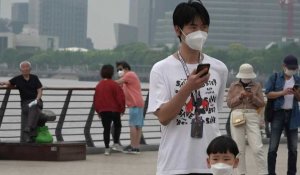 A Shanghai, les habitants prudents après la levée des restrictions