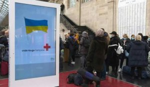 Paris: des réfugiés ukrainiens pris en charge par la Croix-Rouge gare de l'Est