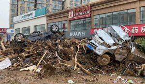 Chine: après des pluies diluviennes, des habitants de Mihe sous le choc