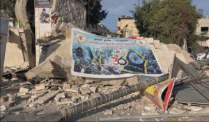 Des Palestiniens constatent les dégâts après un raid israélien à Jénine