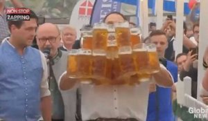Il porte 29 chopes de bières sur 40 mètres, un champion ! (Vidéo)