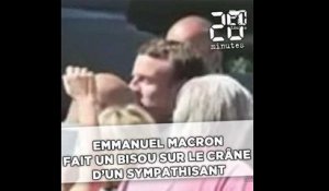 Emmanuel Macron fait un petit bisou sur le crâne d'un sympathisant