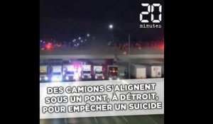 Des camions s'alignent sous un pont, à Détroit, pour empêcher un suicide