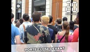 Porte close devant les Nike store des Champs-Élysées