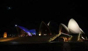 Sydney opera house lights up in honour of aboriginal art
