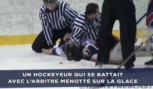 Un hockeyeur qui se battait avec l'arbitre menotté à même la glace