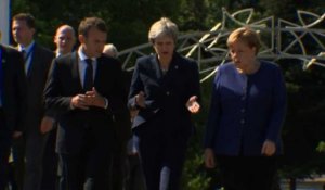 Merkel, May et Macron arrivent ensemble au sommet de l'UE