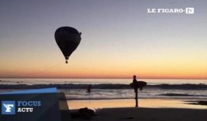 Une montgolfière sauvée par des surfeurs après avoir échoué dans l'eau