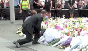 Australie: fleurs et hommages sur le site de la prise d'otages