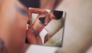 Rihanna montre son derrière dans un petit bikini à l'imprimé peau de serpent