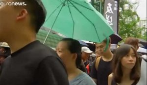 Des manifestants occupent l'aéroport de Hong Kong