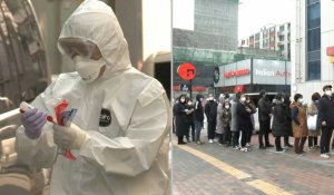 Désinfection, files d'attente pour des masques à Daegu alors que l'épidémie se renforce
