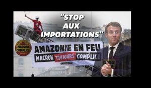 "Macron toujours complice", les images de l'action coup de poing de Greenpeace devant l'Élysée
