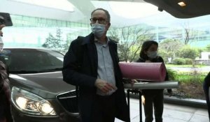 Un expert de l'OMS arrive à l'aéroport de Wuhan alors que l'enquête en Chine est achevée