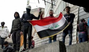 Des Irakiens manifestent rue Al-Rachid à Bagdad