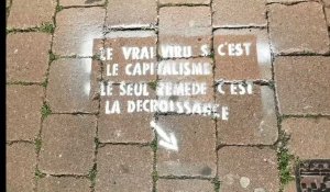 Des tags contre le consumérisme dans les rues de Namur