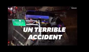 À New York, un impressionnant accident laisse un bus suspendu au-dessus de la route