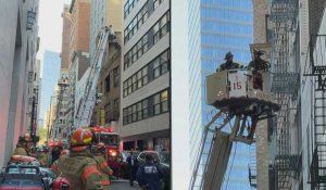 USA: des pompiers interviennent après l'effondrement meurtrier d'un parking à New York