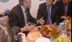 [N. Sarkozy et F. Hollande au salon de l'agriculture]