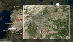 L'aviation syrienne bombarde le camp de Yarmouk, de...