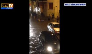 Innondations : Un homme fait du Kayak entre les voitures à Sète