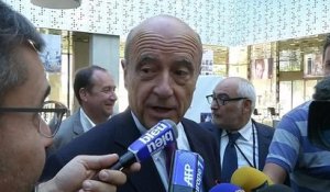 Juppé met en garde Sarkozy sur le respect de "primaires ouvertes" pour 2017