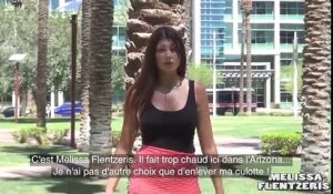 Pour s'amuser cette jeune femme se déshabille en pleine rue