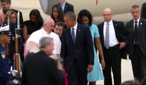 La famille Obama accueille le pape François