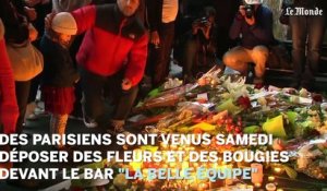 Les Parisiens se recueillent devant "La Belle Equipe"