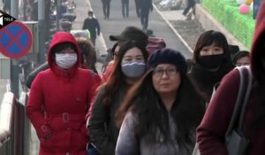 A nouveau sous alerte rouge à la pollution, Pékin suffoque sous un brouillard toxique