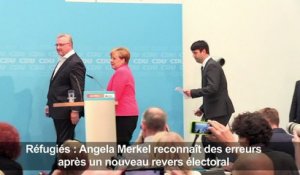 Réfugiés: Merkel reconnaît des erreurs après un revers électoral