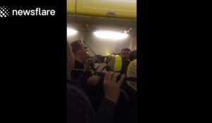 Musicians 'cheer up' air stewards with impromptu performance on flight