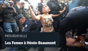 Des Femen manifestent près du bureau de vote de Marine Le Pen