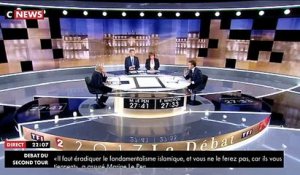 Spécial Débat - Emmanuel Macron sur le terrorisme: "Mme Le Pen, ce que vous proposez c'est de la poudre de Perlimpimpin"
