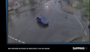 Des voitures de police se percutent à un feu rouge (vidéo)