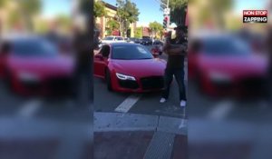 Un homme se prend une raclée après avoir frappé dans une Audi R8 (Vidéo)