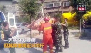 Chine : Un homme de 230kg se fait sortir par la fenêtre par des pompiers !