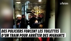 Des policiers forcent les toilettes d'un train pour arrêter des migrants
