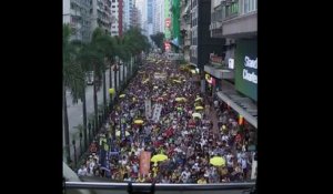 Des milliers de personnes manifestent dans les rues de Hong Kong contre un projet de loi du gouvernement local