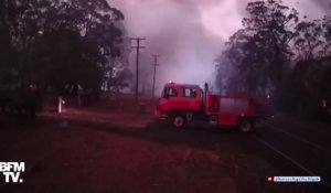 Australie: des pompiers échappent de justesse à de puissantes flammes