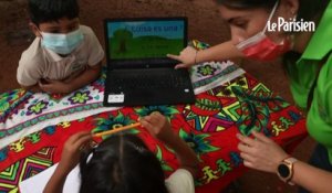 Au Panama, une prof prend son canoë pour enseigner à des élèves privés de cours en ligne